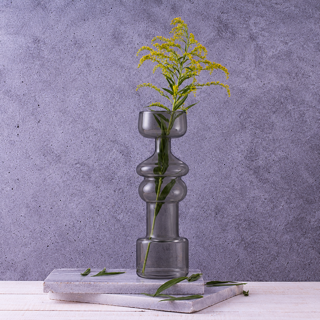 The Cero 3 vase recolored to smoky gray, same photo as the clear version